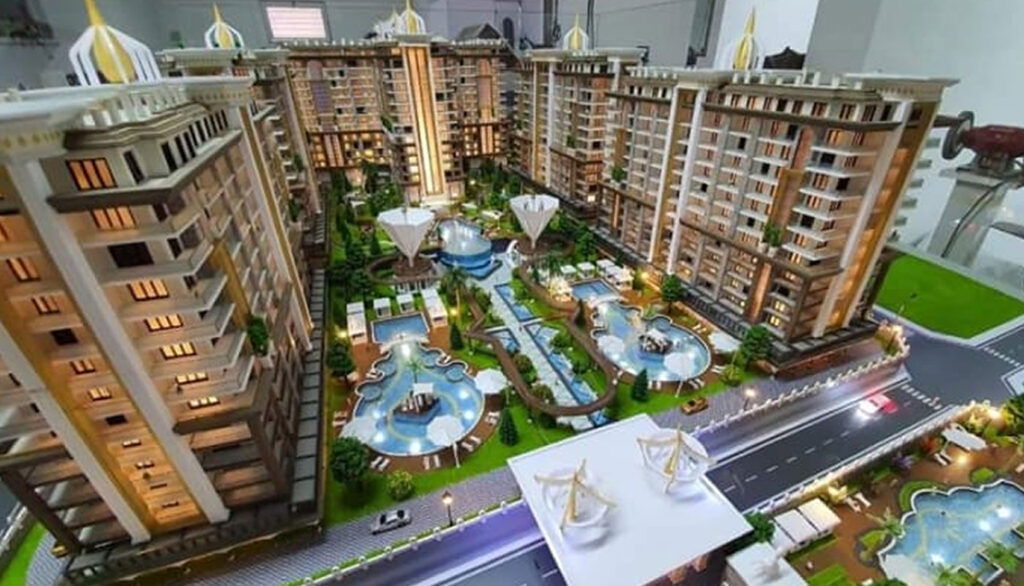 Great Investing in Istanbul: Exploring Off Plan Projects 2 Aerial mock-up of the entire off-plan project, displaying the building, surrounding areas, and access roads.